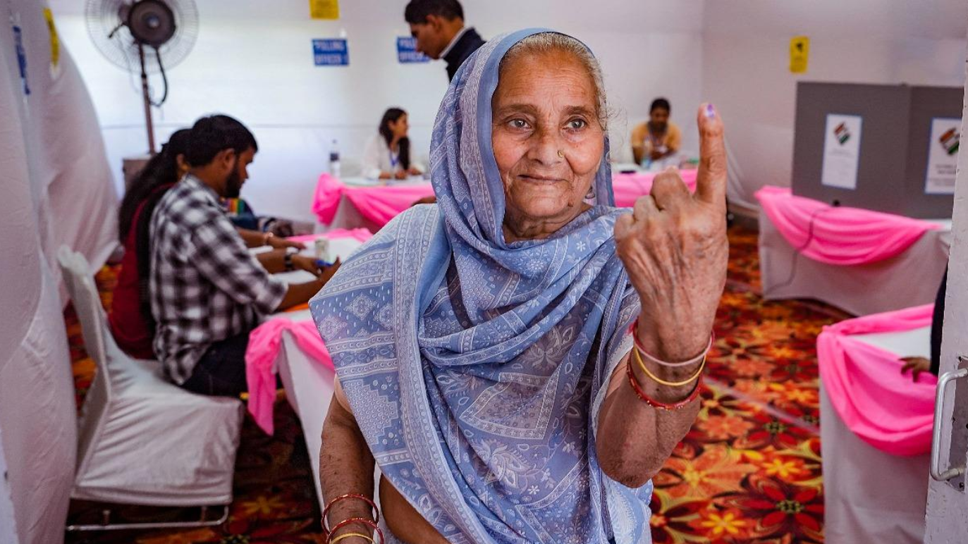 Close-up of an Indian voter's ink-marked index finger, symbolising electoral participation and the importance of accurate voter registration